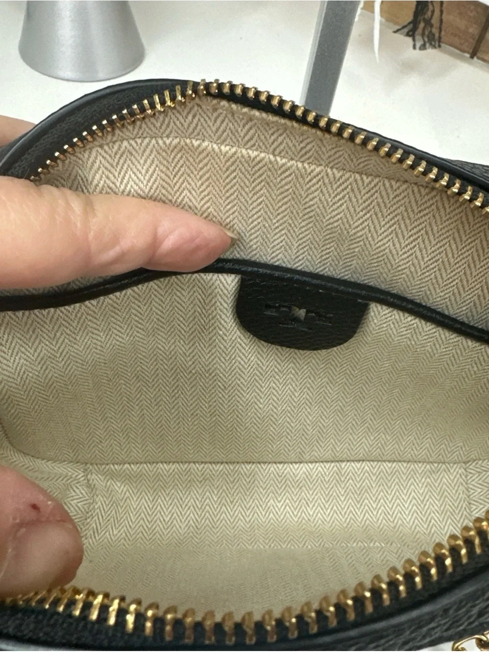 Tory Burch McGraw Crossbody tassle bag black pebbled leather Double T logo.